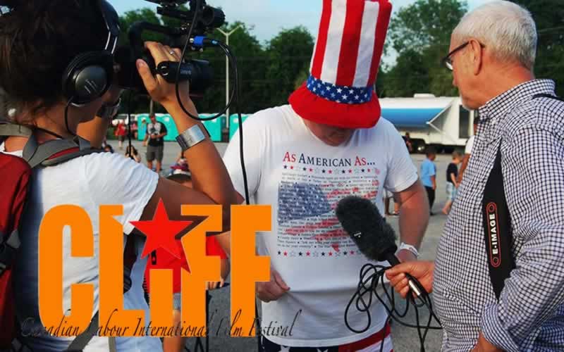 Canadian Labour International Film Festival (CLIFF). News reporter interviewing someone wearing a shirt that says: As american as...