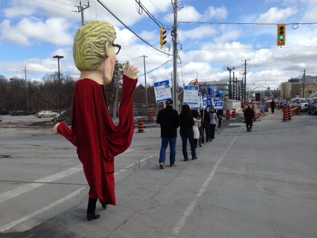 OPSEU members attending rally with Kathleen Wynne puppet