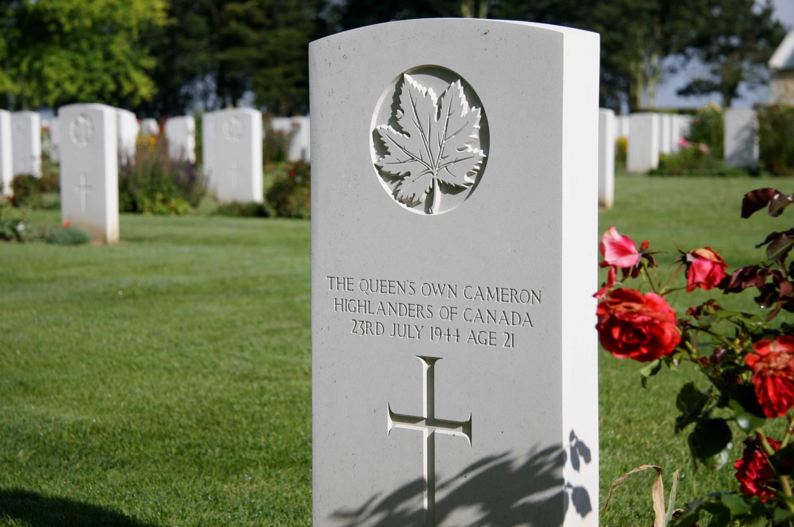 Headstone of 21 year old fallen soldier. Shot taken at the memorial Canadian cemetery in Normandy France, Bény-sur-Mer Canadian War Cemetery.