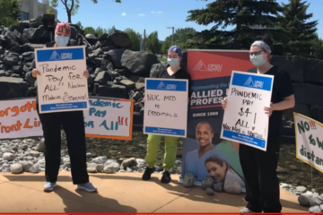 HPD rally on June 12, 2020 at the Thunder Bay Hospital. Shot of workers holding signs