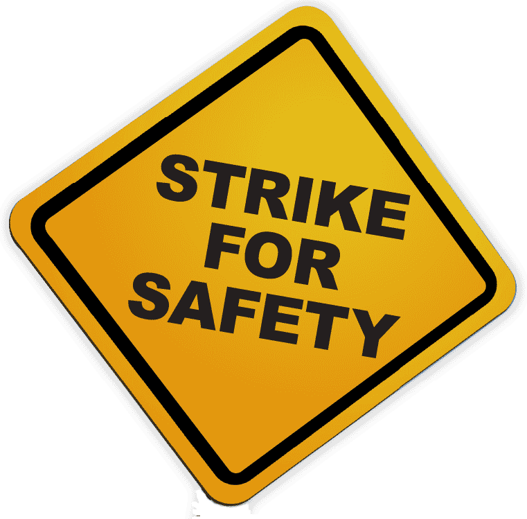 Yellow traffic sign that reads: "Strike for Safety"