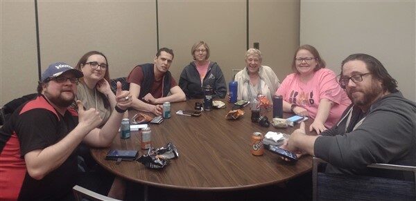 Members sitting at a table at PYC Trivia Night