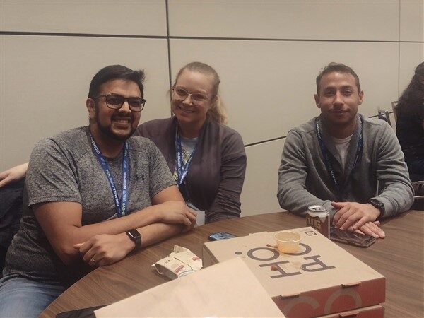 Members sitting at a table at PYC Trivia Night