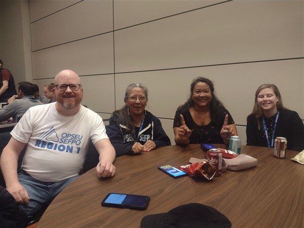 Members sitting at a table at PYC Trivia Night