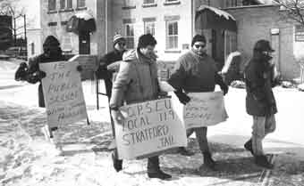 Five OPSEU members protesting
